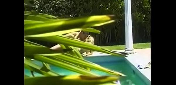 Handsome stud fucks lover passionately by the pool